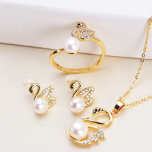 SWIRLUXE GOLD SWAN JEWELRY SET