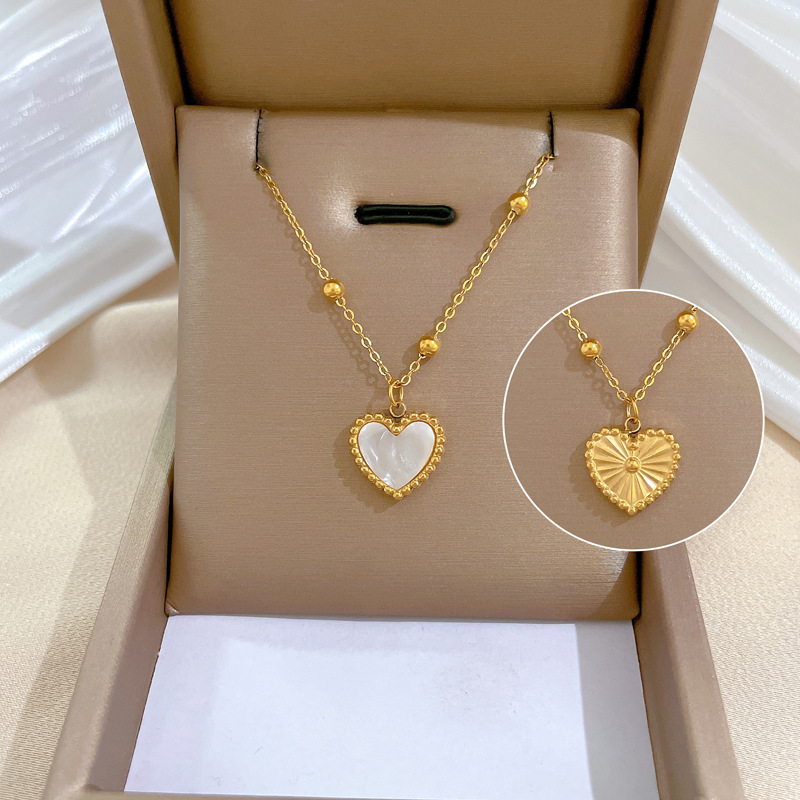 SWIRLUXE GOLD HEART SHELL NECKLACE